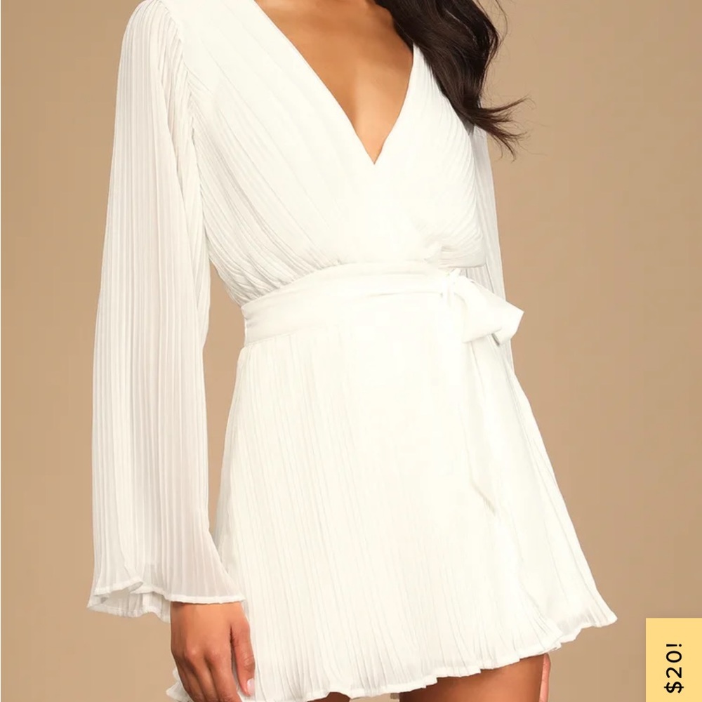 Lulu’s ivory pleated skort romper